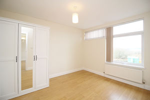 Bedroom One- click for photo gallery